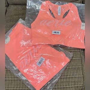 Aerie brand new with tags sports bra and bike shorts set. Neon orange. Size XL